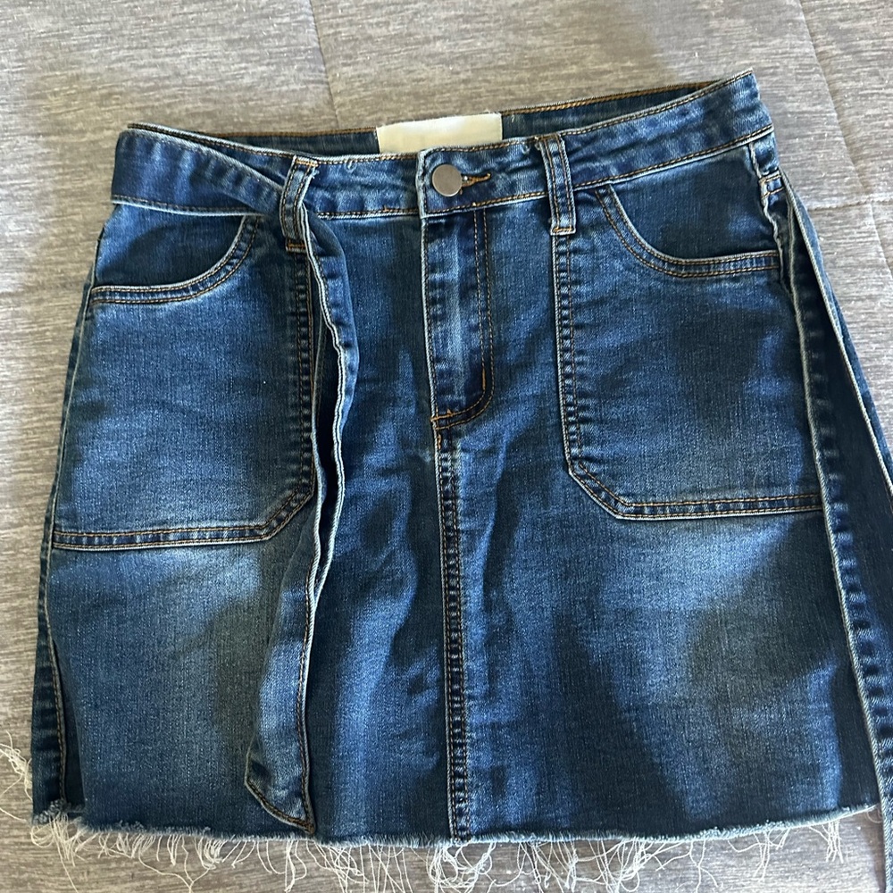 Denim skirt with tie belt and frayed hem